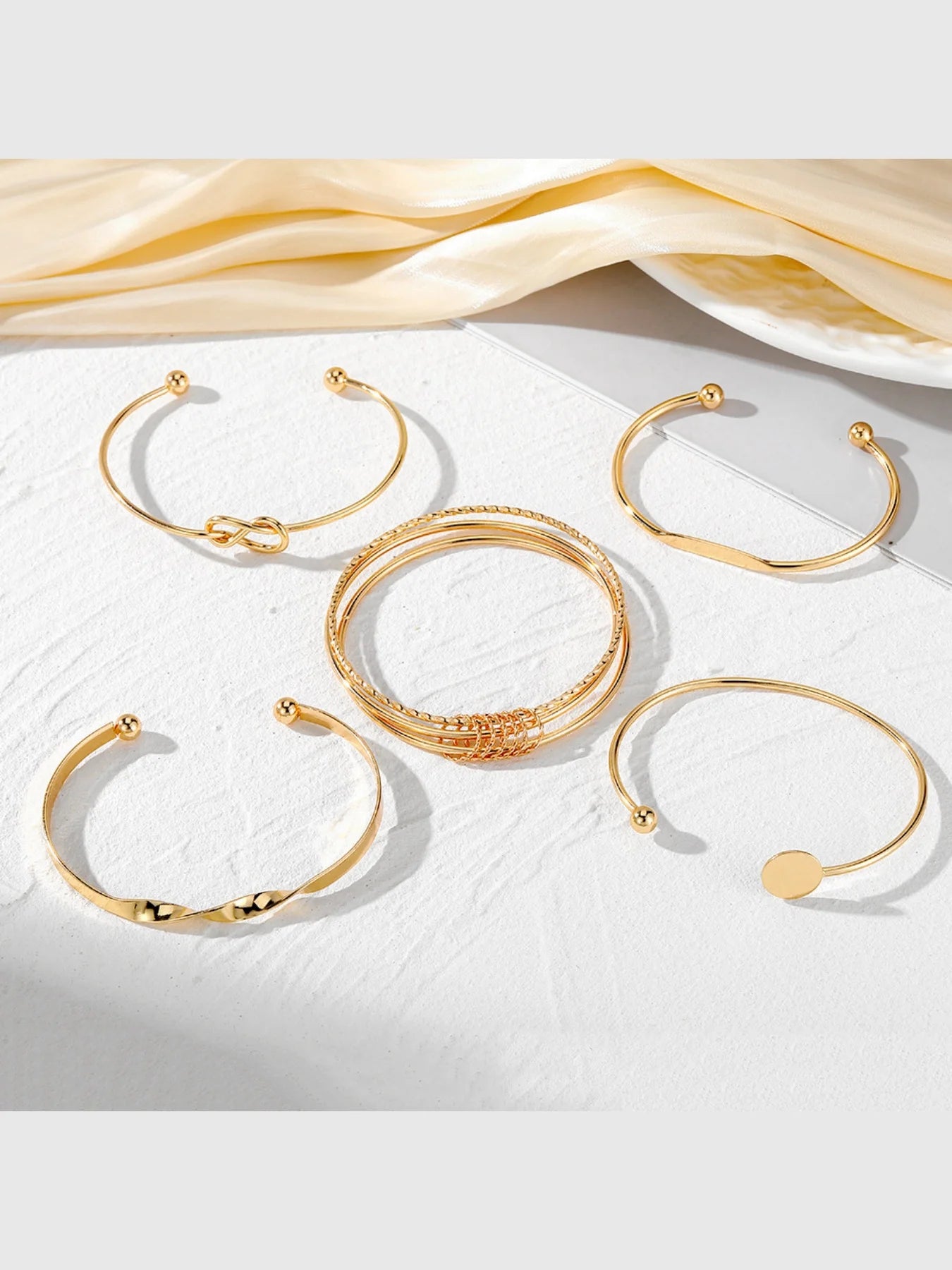 Elegant Twist Bangle Collection