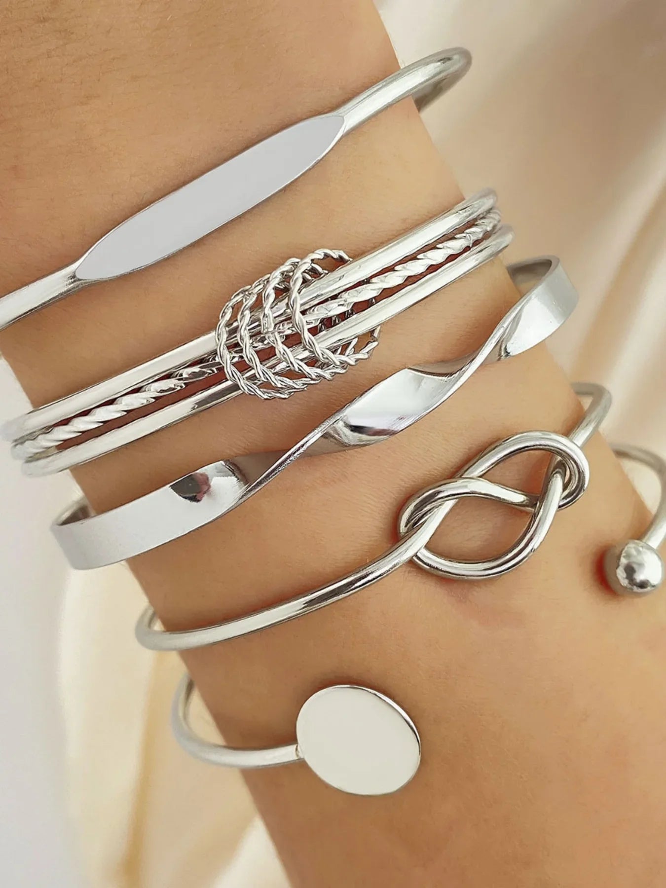 Elegant Twist Bangle Collection