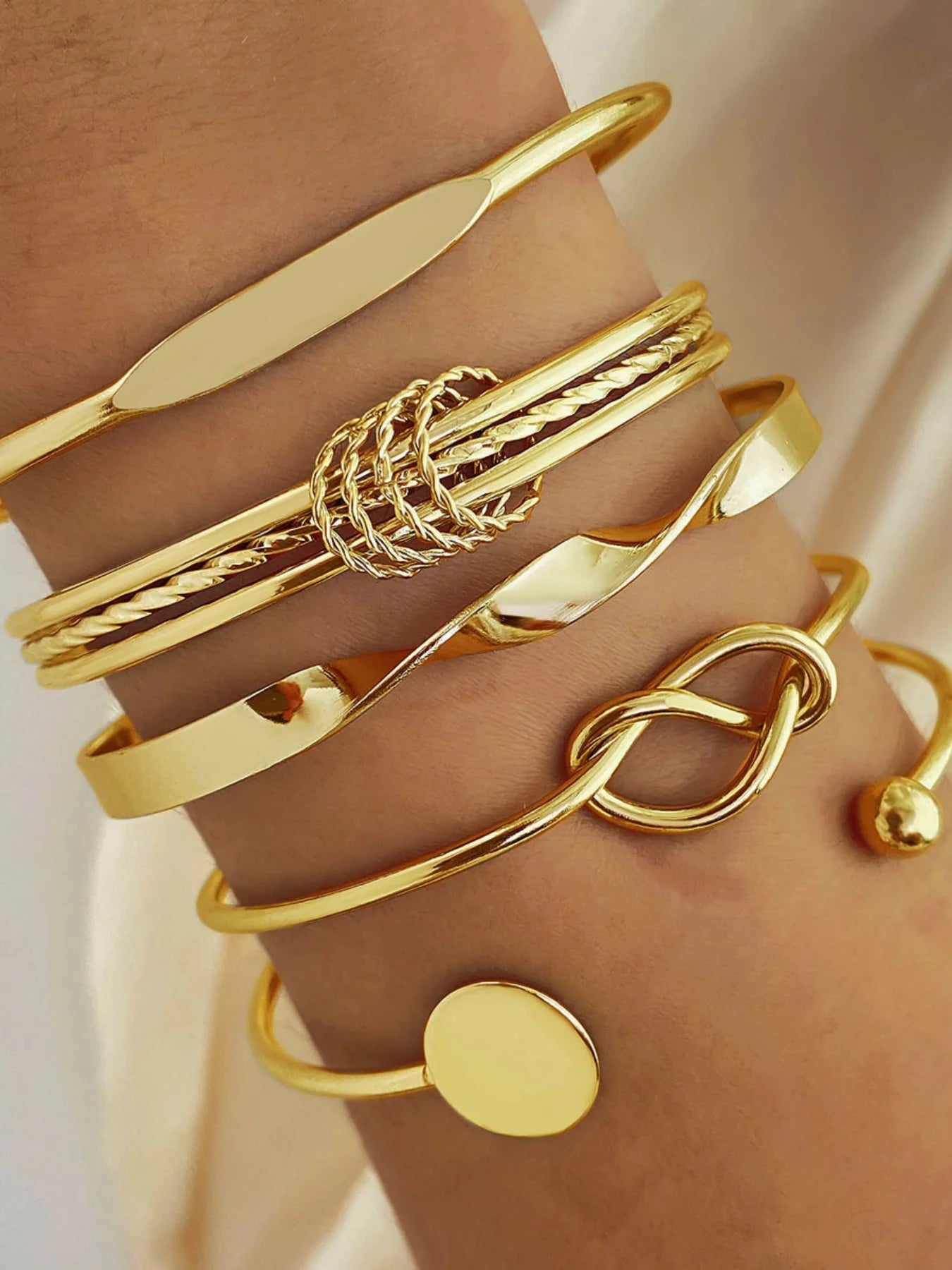 Elegant Twist Bangle Collection